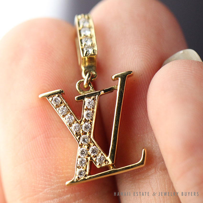 Sold at Auction: Louis Vuitton LV Volt 18k Gold Diamond Pendant