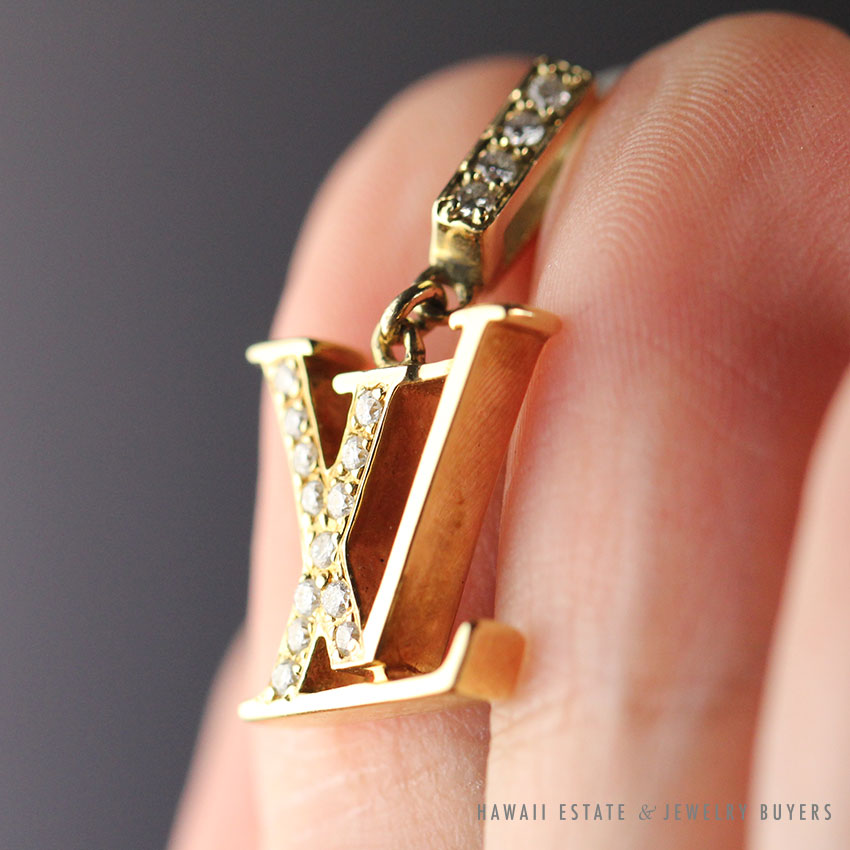 Sold at Auction: Louis Vuitton LV Volt 18k Gold Diamond Pendant